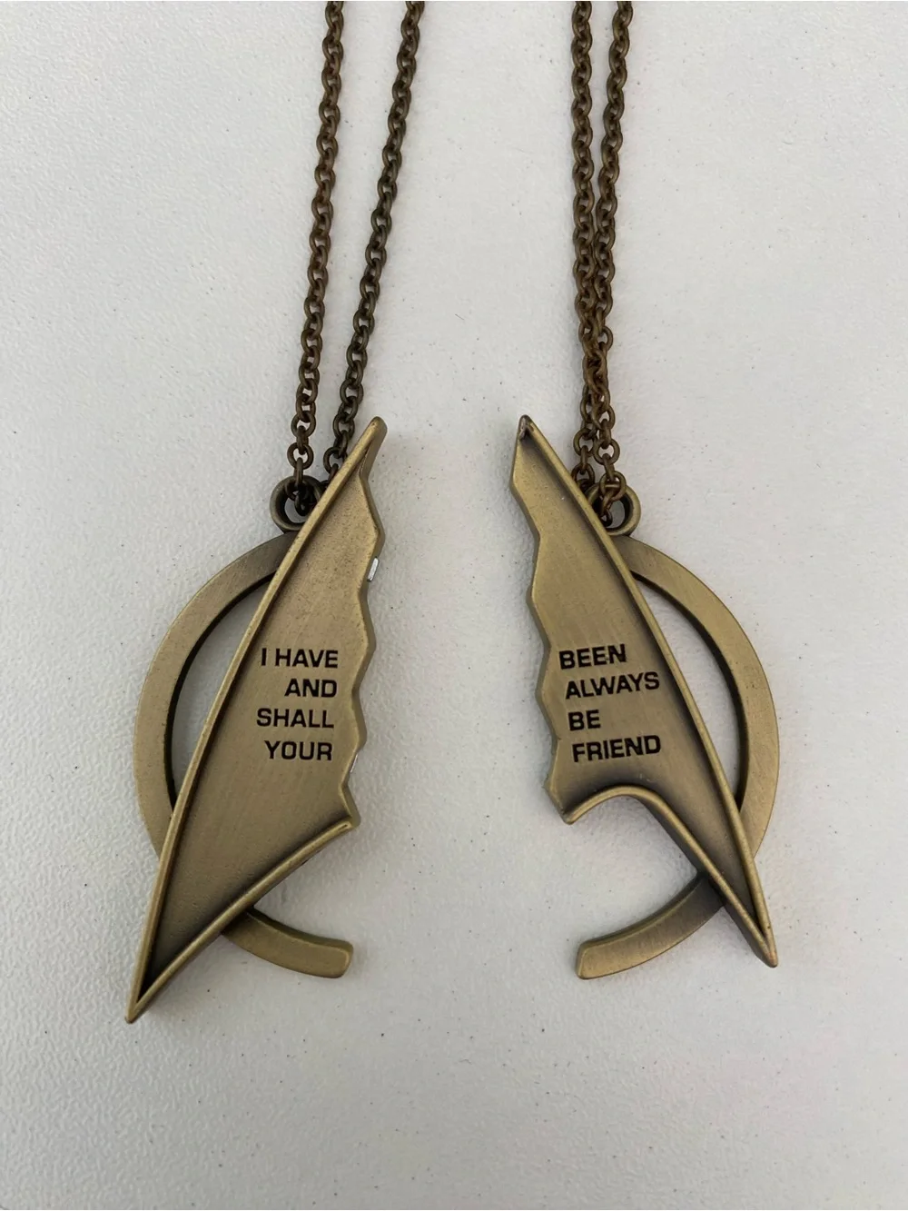 Quantum Mechanix Star Trek Delta magnetic friendship necklaces.